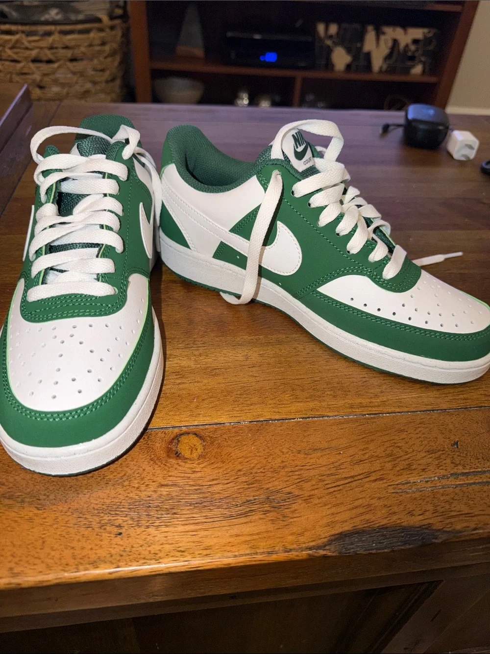 Nike White and Green Low-Top Sneakers — Classic Swoosh Design